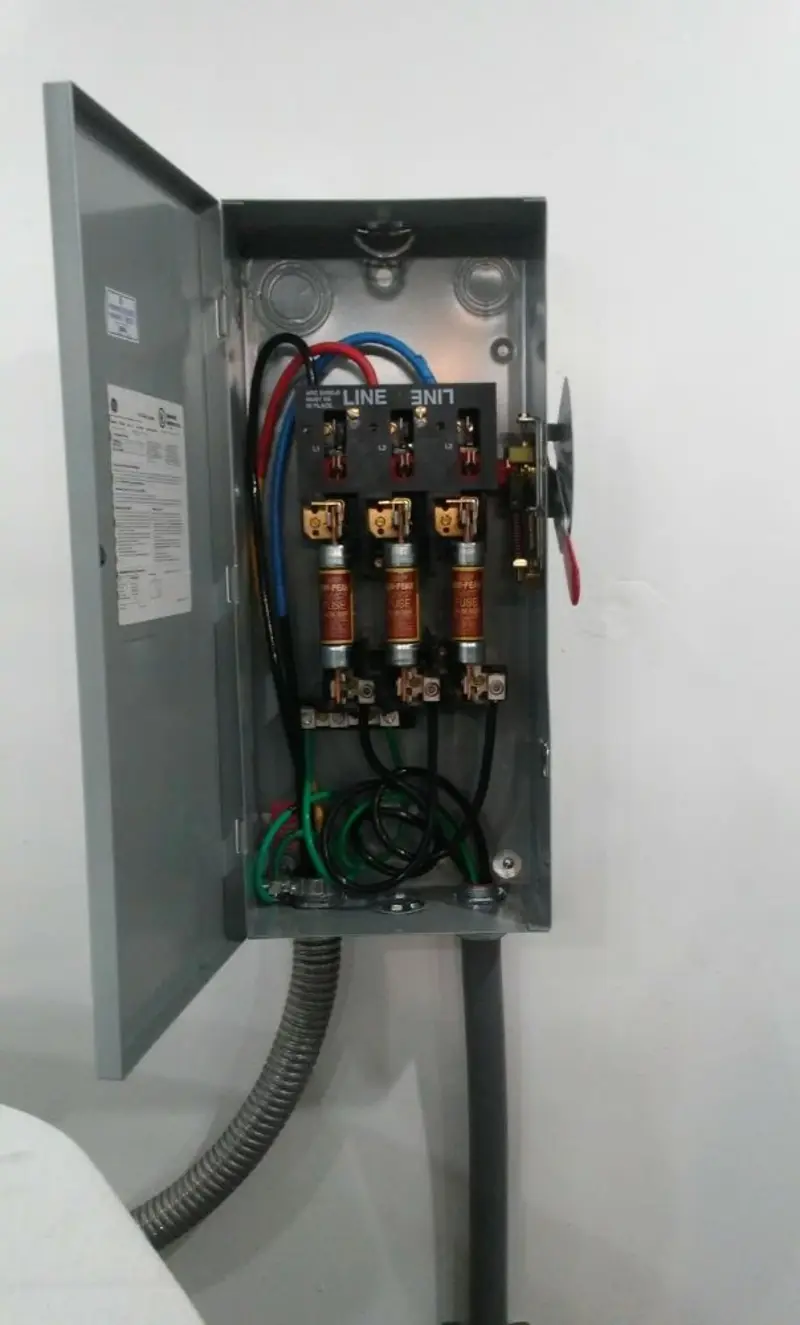 Three-phase disconnect switch installed for Smoke Detector Installation in Chanute